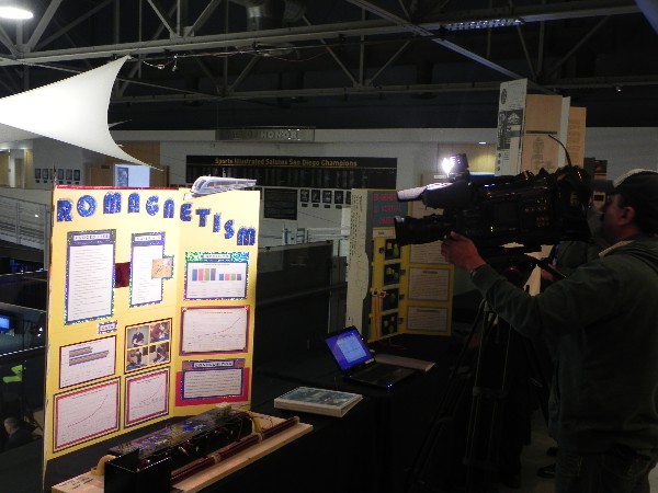 In April, the media is invited to view student science fair projects at a competition.